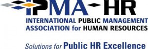 Logo of the International Public Management Association for Human Resources (IPMA-HR). The text reads "IPMA-HR: International Public Management Association for Human Resources. Solutions for Public HR Excellence." The logo features geometric shapes and bold fonts, emphasizing IPMA's commitment to HR excellence.