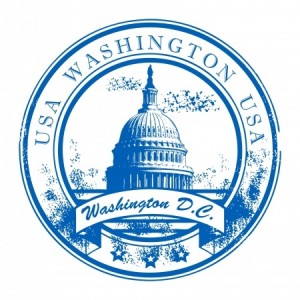 A blue circular stamp design featuring the U.S. Capitol building at the center. Surrounding the image are the words "USA WASHINGTON USA" along the outer edge. Below the Capitol is a ribbon that reads "Washington D.C." with star decorations at the bottom, symbolizing government pride.