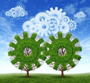 Illustration of two trees with green leaves trimmed into gear shapes, standing on a grassy field against a blue sky with white clouds. Above the trees, white gear shapes are blending into the clouds, symbolizing a connection between nature and technology—akin to the innovation seen in mobile job search advancements.