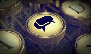 Close-up of a vintage typewriter key with a speech bubble icon on it, surrounded by interconnected lines resembling a web. The image highlights communication and connection through a retro technological device, reminiscent of LinkedIn's networking style.