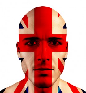 A bald man with a serious expression has the British flag painted across his face, covering his entire face in red, white, and blue, resembling an emblem of local government pride. The background is plain white.