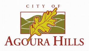 Logo for the City of Agoura Hills. It features a stylized oak leaf in yellow and green over a green hilly landscape within a rectangular frame. The text "City of Agoura Hills" is written in red, with "City of" above the frame and "Agoura Hills" below it, symbolizing potential careers in government.