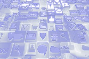 A 3D rendering of various social media and communication icons in a blue hue. The icons include symbols like a heart, envelope, speech bubble, hashtag, magnifying glass, thumbs-up, and more, arranged in a grid pattern on a shiny, reflective surface.