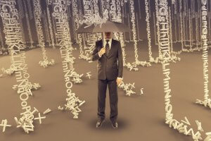 A man in a suit stands under an umbrella amid a surreal environment where letters and numbers fall like rain. The ground is covered in scattered characters, with columns of falling text surrounding him, creating a visually striking and abstract scene.