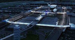 Aerial view of LAX at night, showcasing brightly lit terminals connected by elevated walkways. The airport features a central futuristic building with a distinctive structure. The surrounding area includes parking lots, airplanes, and nearby roads.