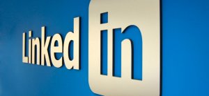 The LinkedIn logo is displayed against a bright blue background, showcasing the company's name with "Linked" in white letters and "in" in a white square. The modern, clean design reflects Linkedin's brand identity as a professional networking platform.