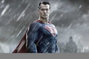A figure dressed as Superman stands heroically in the rain, exuding leadership in a blue suit with the iconic red and yellow 'S' emblem on his chest and a red cape. The dark and stormy background heightens the dramatic effect of the scene.