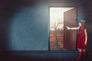 A young girl in a red dress and matching boots stands inside a dimly lit room, reaching out towards an open door. Outside, under the watchful eye of a government building, there is a bright, sunny scene with a tree and a warm, golden glow.