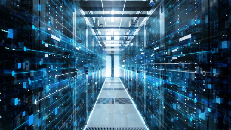 A futuristic hallway lined with server racks, filled with blue LED lights and digital interfaces, pulses with streams of information. The perspective draws the eye towards a bright light at the end of the corridor, creating a high-tech, immersive atmosphere.