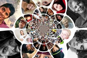 A vibrant collage of numerous portraits of diverse individuals, arranged in concentric circles. The faces vary in age, ethnicity, expression, and job roles, creating a visually captivating and inclusive representation of humanity.