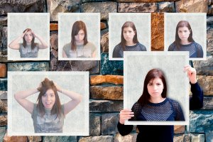 A brick wall displays six photographs of the same woman with different expressions: one with hands on head, confused; one looking down, shy; one neutral; one stern; one with wide eyes and raised eyebrows, surprised; and one holding a photo, serious—each telling a story if you listen closely.