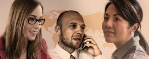 Three people depicted in a single image: a woman with glasses smiling, your boss in the center talking on a phone, and a woman on the right looking towards the camera. A light brown world map is faintly visible in the background.