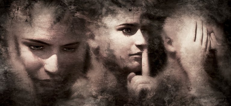A dark, textured image showing three faces: one looking down in contemplation, one with a finger against their lips signaling silence, and one with both hands covering ears. The image has a mysterious, distressed appearance, evoking an elusive sense of feedback from each expression.