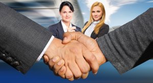 A close-up of a handshake between two negotiators in business attire. In the background, two women in professional clothing smile confidently. The image is set against a dynamic, blurred backdrop suggesting motion or progress.