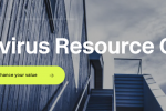An outdoor architectural structure with blue tones from modern buildings in the background. Text overlay reads "Coronavirus Resource Center" and a green button below it says "Resources that protect and enhance your value." Sky is partly cloudy.