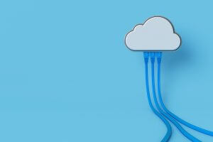 A white cloud icon is connected to multiple blue cables on a light blue background, symbolizing cloud computing, wifi, and data connections.