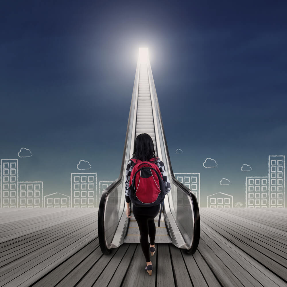 Bright,Future,Concept,With,Female,College,Student,Stepping,Up,On