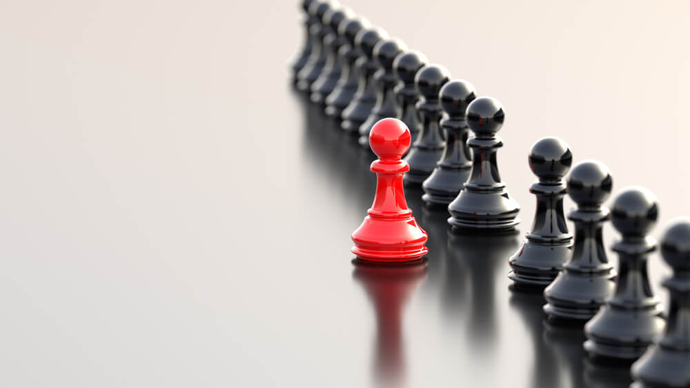 Leadership,Concept,,Red,Pawn,Of,Chess,,Standing,Out,From,The