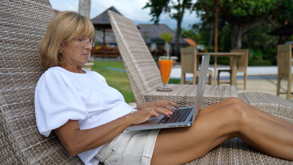 Middle,Aged,Caucasian,Woman,Works,On,Her,Computer,On,A women's leadership