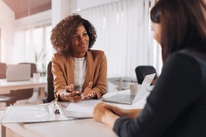 Two women sitting and having a conversation