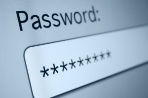 Close-up of a computer screen with a password input field. The word "Password:" is prominently displayed above, while the field itself is filled with asterisks to securely mask the password.