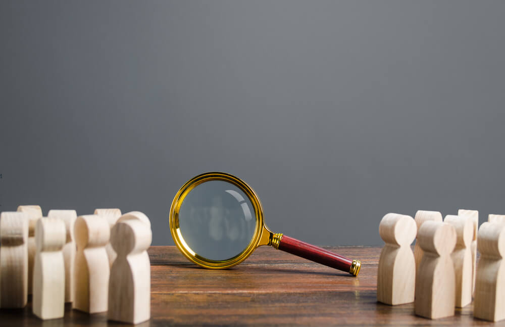 People,Looking,At,Big,Magnifying,Glass.,Search,And,Tracing,Concept,