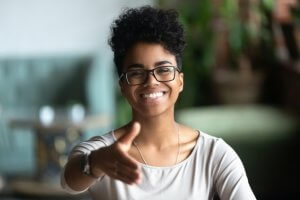 A woman stretching her hand for a handshake