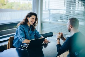 A woman and a man having a job interview