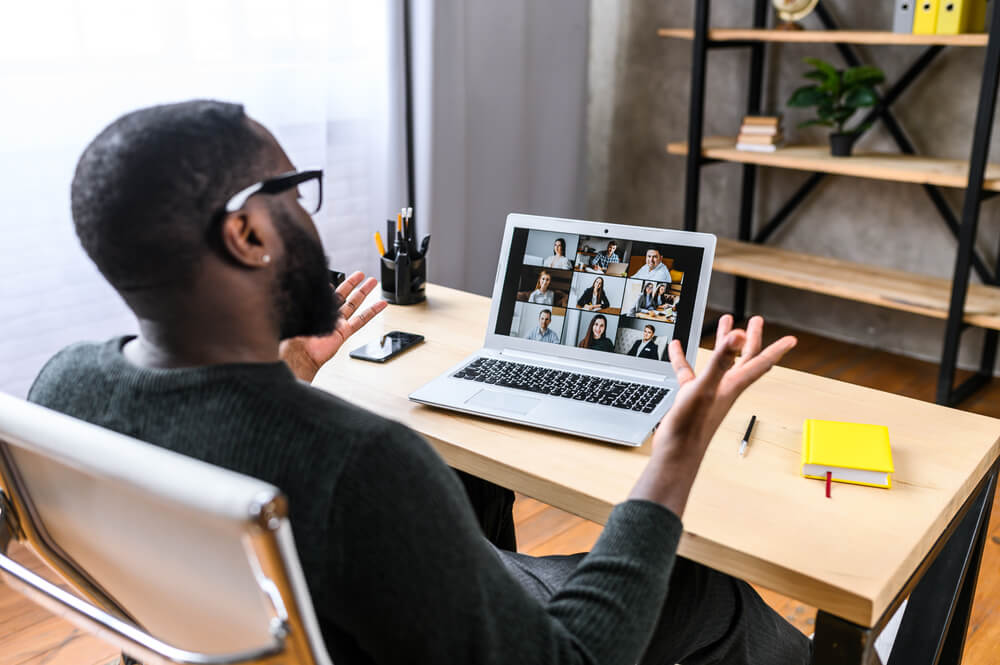 Virtual,Meeting,With,Many,People,Together.,African-american,Young,Guy,Talking women's leadership