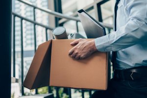 A man holding a cardboard box