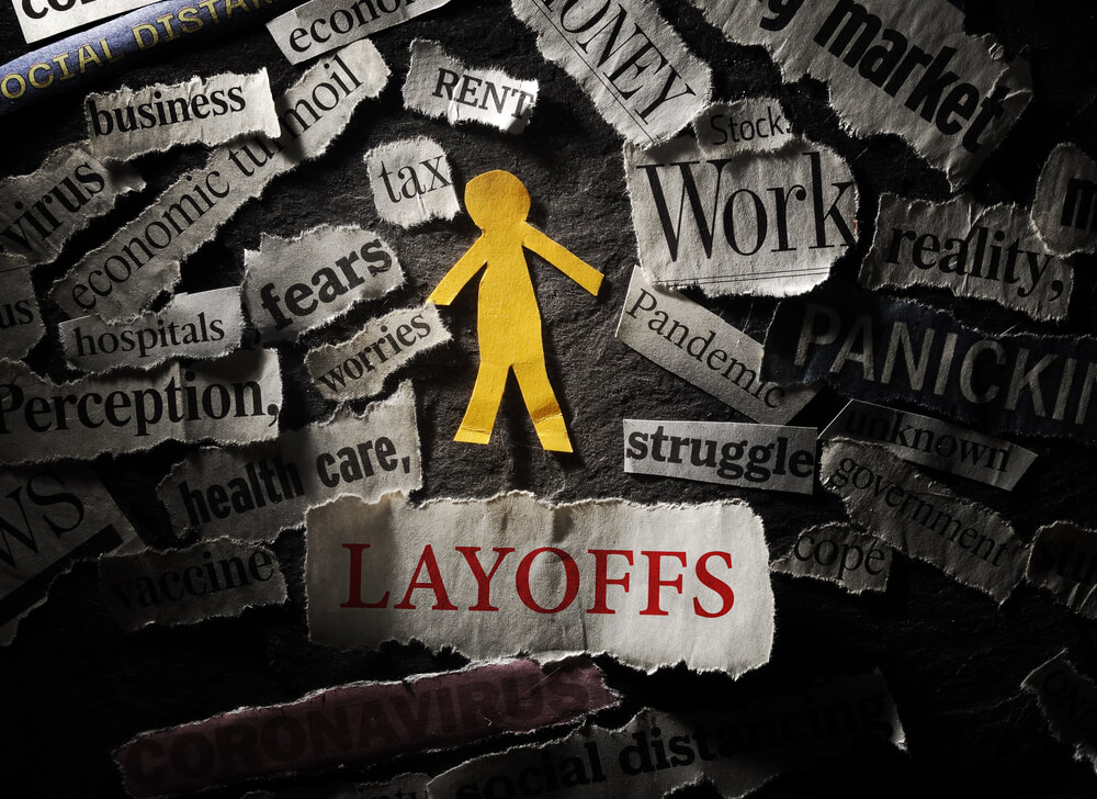Paper,Cutout,Person,With,Layoffs,Headline,,Surrounded,By,Coronavirus,And leadership