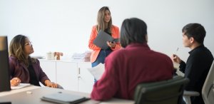 A group of four student having a discussion