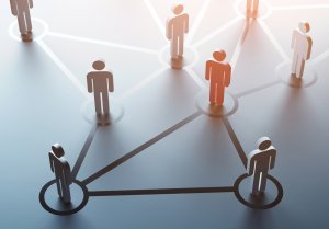A conceptual illustration of a network, featuring stylized human figures connected by lines. The figures stand inside circles at various points, symbolizing interconnectedness and the flow of communication or relationships within a social or professional network, crucial for career development.