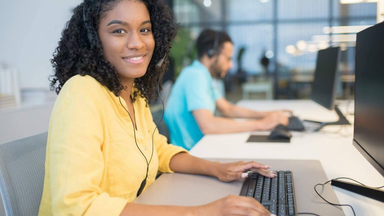 A woman pressing her laptop - Broward County