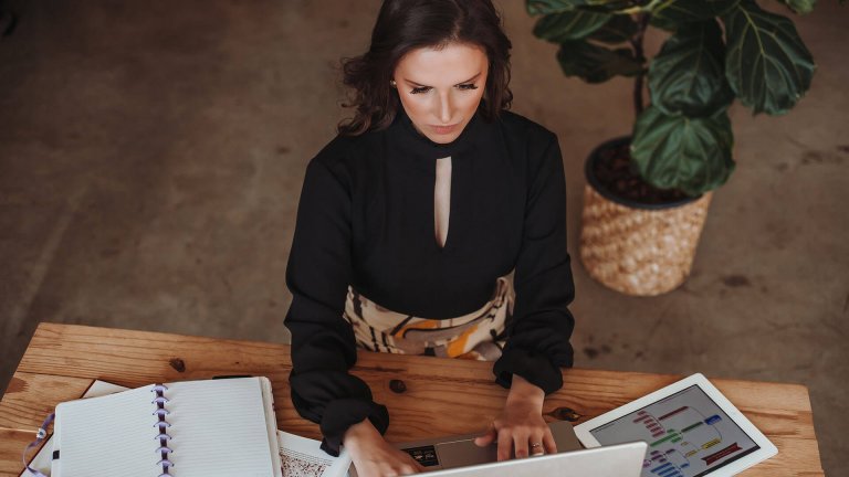 A woman working with a laptop - Georgia - Career In Government