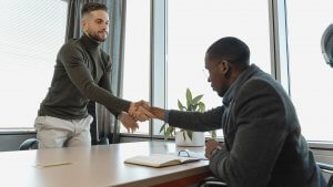 Image of a two men shaking hands - Virginia