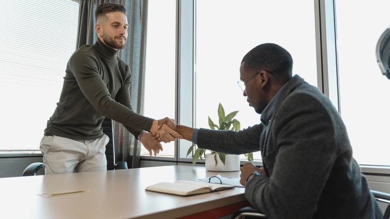 Image of a two men shaking hands - Virginia