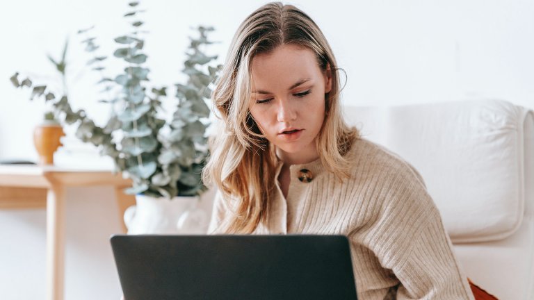 Women looking at her laptop screen - Harris County