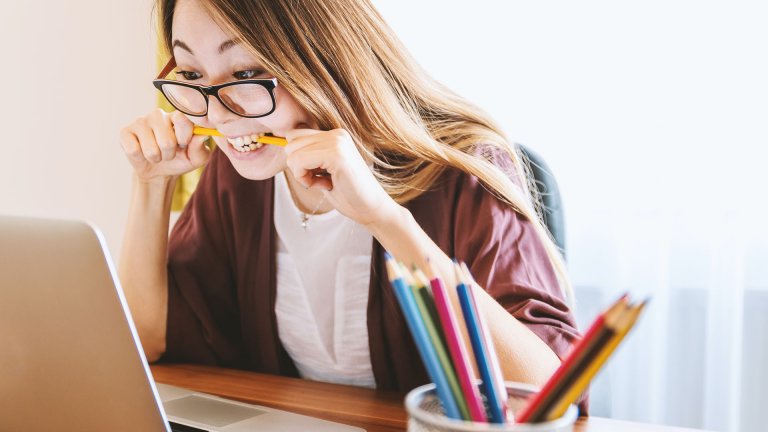 A woman staring at laptop - Collin Country - Careers in Government