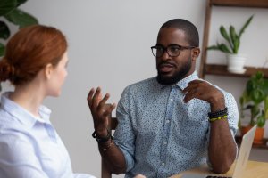 A Black man during an interview with employer