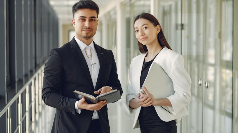A woman and a man in blazers - Greenville - Careers In Government