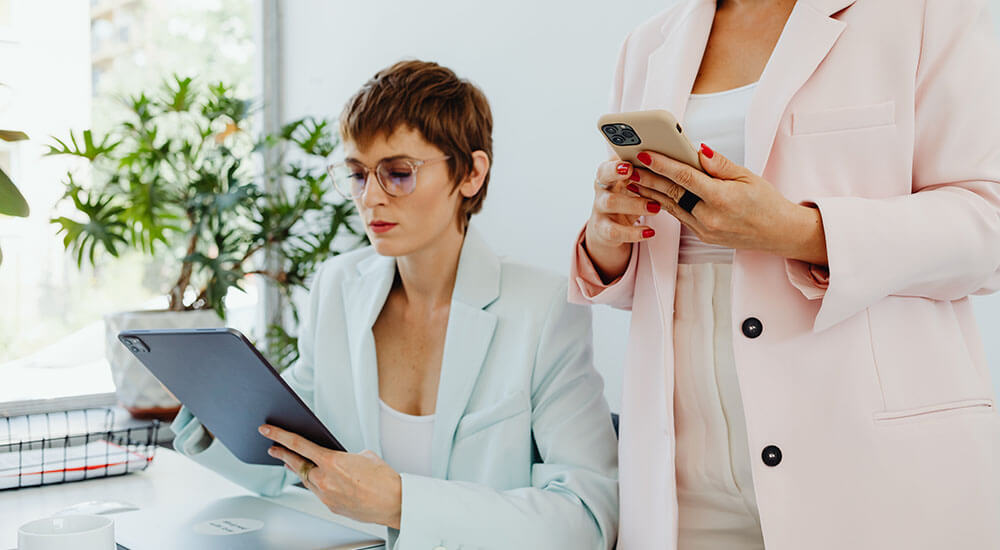 A female worker with another woman standing beside her - Contract Jobs in Atlanta GA - Careers In Government