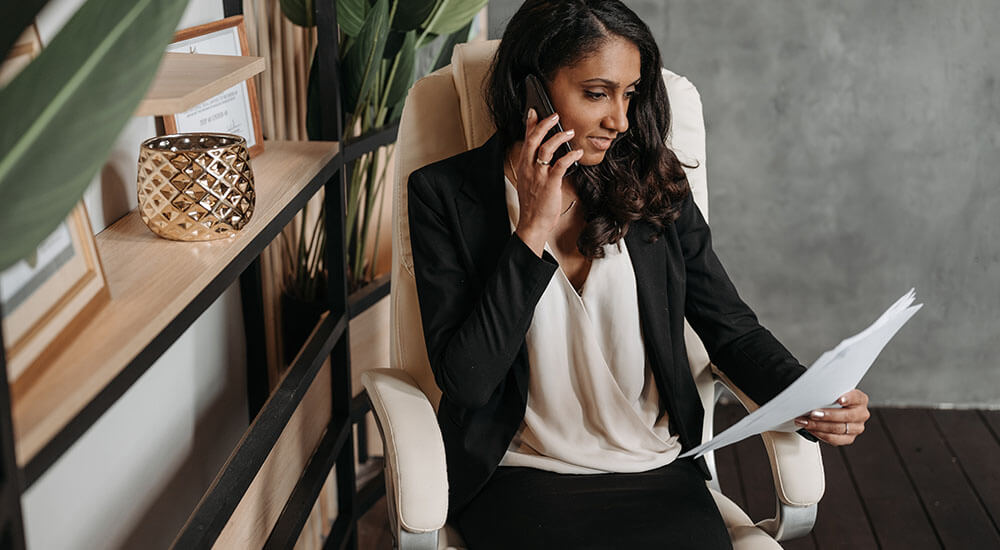 A woman holding a paper - Atlanta Georgia - Careers In Government