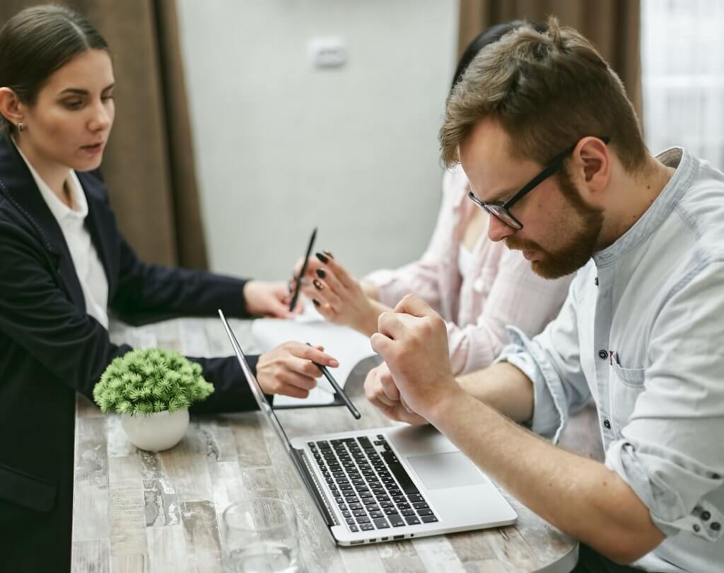 People at work looking at a screen