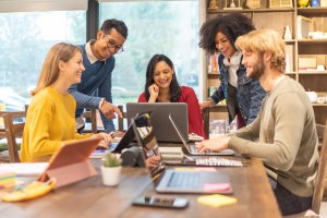 Multiethnic group of business people working and talking