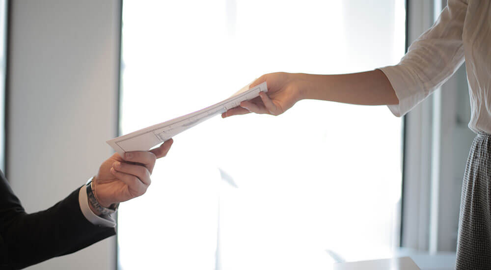 People handling document to one another - State Government Jobs in Atlanta GA - Careers In Government