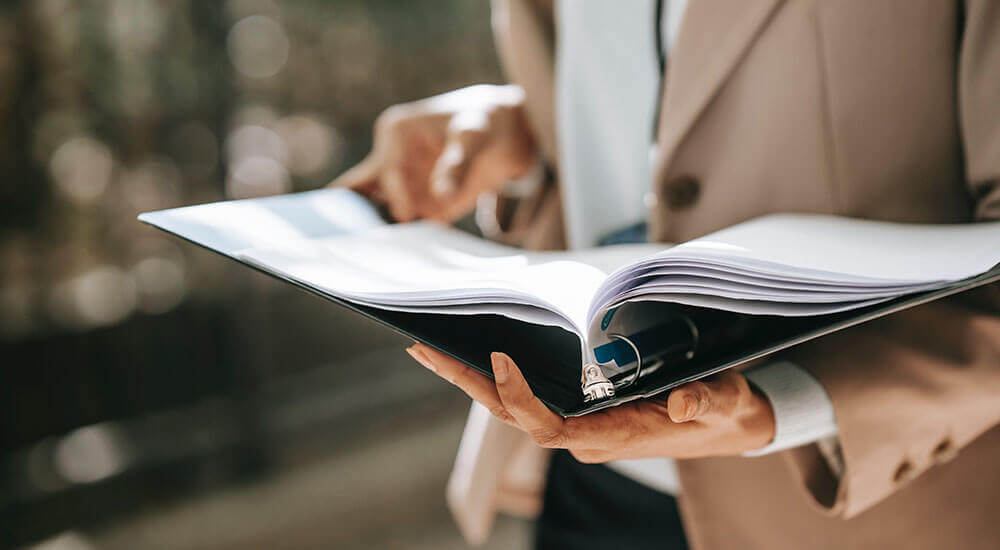 Someone looking at a document - Lexington County - Careers In Government