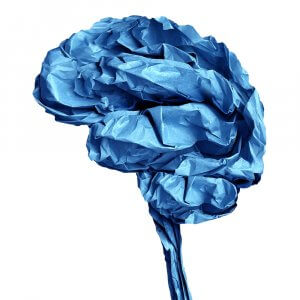 A crumpled paper formed as a human brain