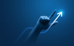 Hand pointing to growth arrow success