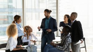 Diverse multiethnic business people gather at a Casual meeting in office